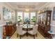 Dining room showcasing chandelier, round table, and classic cabinet at 537 Botany Loop # 537, Murrells Inlet, SC 29576