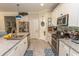 Well-lit kitchen featuring granite counters, stainless steel appliances, and tiled floors at 537 Botany Loop # 537, Murrells Inlet, SC 29576