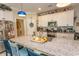 Kitchen featuring granite counters, ample cabinet space, and an island with seating at 537 Botany Loop # 537, Murrells Inlet, SC 29576