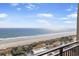 Balcony with ocean view of beach and the coastline with the sky and sunshine at 5523 N Ocean Blvd. # 1506, Myrtle Beach, SC 29577