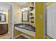 Bathroom featuring vanity sink, overhead vanity lighting, and door to the water closet at 5523 N Ocean Blvd. # 1506, Myrtle Beach, SC 29577