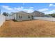 Spacious backyard with white picket fence, patio, and well-maintained lawn at 591 Meadowgrass Ct., Myrtle Beach, SC 29588