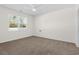 Bright bedroom with neutral carpet, a large window and ceiling fan at 591 Meadowgrass Ct., Myrtle Beach, SC 29588