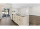 Kitchen island featuring stainless steel appliances, granite countertops, and a sink at 591 Meadowgrass Ct., Myrtle Beach, SC 29588