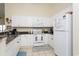 Well-equipped kitchen with white cabinetry and sleek countertops at 601 Hillside Dr. N # 1731, North Myrtle Beach, SC 29582