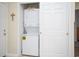 In-unit laundry area featuring a stacked washer and dryer at 601 Hillside Dr. N # 1731, North Myrtle Beach, SC 29582