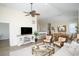 Cozy living room and dining room featuring a ceiling fan, and neutral colored walls at 601 Hillside Dr. N # 1731, North Myrtle Beach, SC 29582