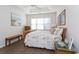 Calm main bedroom featuring a trey ceiling, bench, and beach-themed decor at 601 Hillside Dr. N # 1731, North Myrtle Beach, SC 29582