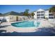 Community swimming pool with lounge chairs and umbrellas, perfect for relaxation and recreation at 601 Hillside Dr. N # 1731, North Myrtle Beach, SC 29582