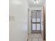 Hallway with ceramic tile floor leading to the unit entrance at 613 South Ocean Blvd. # O-2, North Myrtle Beach, SC 29582