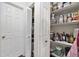 Well-organized pantry with shelving offering ample storage for food, kitchenware, and cooking supplies at 617 S 13Th Ave. # 116, Surfside Beach, SC 29575