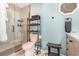 Well-lit bathroom with a sleek glass shower, stylish hexagon tile flooring, and modern fixtures at 639 Blackstone Dr., Myrtle Beach, SC 29588