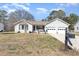 Well-maintained single-story home with a manicured lawn and a two-car garage at 639 Blackstone Dr., Myrtle Beach, SC 29588