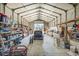 Large garage featuring a vintage car, shelving, and workspace, ideal for automotive enthusiasts and storage at 639 Blackstone Dr., Myrtle Beach, SC 29588