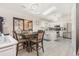 Open floor plan showing kitchen with stainless appliances and a dining area under skylights at 639 Blackstone Dr., Myrtle Beach, SC 29588