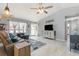 Bright living room with vaulted ceilings, a ceiling fan, and lots of natural light at 639 Blackstone Dr., Myrtle Beach, SC 29588