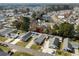 Aerial view of a neighborhood featuring neat lawns, driveways, fenced yards, and mature trees at 9840 Conifer Ln., Murrells Inlet, SC 29576