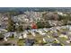 Wide aerial shot showcasing the community with a lush tree line bordering a neighborhood at 9840 Conifer Ln., Murrells Inlet, SC 29576