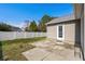 Backyard with door to the house and a white privacy fence for added security at 9840 Conifer Ln., Murrells Inlet, SC 29576