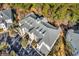 Aerial view of building with lush landscaping, parking, and golf course at 104 Cypress Point Ct. # 302, Myrtle Beach, SC 29579
