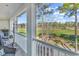 Serene balcony view overlooking golf course; perfect for relaxation at 104 Cypress Point Ct. # 302, Myrtle Beach, SC 29579