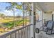Relaxing balcony overlooking lush golf course with comfortable seating at 104 Cypress Point Ct. # 302, Myrtle Beach, SC 29579