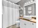 This is a bathroom with a shower, toilet, vanity, and a mirror at 104 Cypress Point Ct. # 302, Myrtle Beach, SC 29579