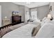 Comfortable bedroom with neutral tones, two beds, and a serene ambiance at 104 Cypress Point Ct. # 302, Myrtle Beach, SC 29579