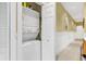 A laundry room with white stackable washer and dryer at 104 Cypress Point Ct. # 302, Myrtle Beach, SC 29579