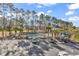 Aerial shot of the outdoor community pool and surrounding amenities at 104 Cypress Point Ct. # 302, Myrtle Beach, SC 29579