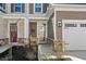 Charming front entrance with stone accents, a welcoming door, and well-maintained landscaping at 115 Galil Dr. # B, Myrtle Beach, SC 29579