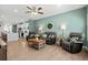 Open-concept living room connected to the kitchen, featuring stylish furnishings and a welcoming atmosphere at 115 Galil Dr. # B, Myrtle Beach, SC 29579