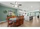 Bright, open-concept living space with modern kitchen, adjacent dining area, and stylish decor at 115 Galil Dr. # B, Myrtle Beach, SC 29579