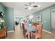 Bright, open-concept living space with modern kitchen, adjacent dining area, and stylish decor at 115 Galil Dr. # B, Myrtle Beach, SC 29579