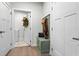 Welcoming mudroom with bench seating, storage cabinets, and convenient access to the laundry room at 115 Galil Dr. # B, Myrtle Beach, SC 29579