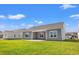 Spacious backyard showcasing a well-maintained lawn and patio for outdoor enjoyment at 1200 Cypress Shoal Dr., Conway, SC 29526