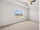 Inviting main bedroom featuring plush carpet, ceiling fan, large window, walk-in closet and neutral paint at 1200 Cypress Shoal Dr., Conway, SC 29526