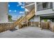 Exterior stairwell and landing area with stairs leading down towards street at 126 N Waccamaw Dr. # 203, Garden City Beach, SC 29576