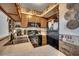 Cozy kitchen featuring stainless steel appliances, decorative backsplash, and ample counter space at 126 N Waccamaw Dr. # 203, Garden City Beach, SC 29576