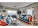 Cozy living room featuring ocean views, comfortable seating, and nautical decor, perfect for relaxation at 126 N Waccamaw Dr. # 203, Garden City Beach, SC 29576