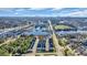 Aerial view of a waterfront neighborhood with a city skyline in the background at 138 Marblehead Dr., Little River, SC 29566