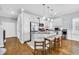 Modern kitchen with stainless steel appliances, island seating, and pendant lighting at 138 Marblehead Dr., Little River, SC 29566