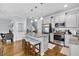 Modern kitchen with granite counters, island seating, and stainless steel appliances at 138 Marblehead Dr., Little River, SC 29566