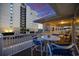 Balcony area with seating, perfect for relaxing and enjoying ocean views at 1420 S Ocean Blvd., North Myrtle Beach, SC 29582