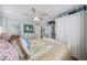 Charming bedroom with a decorative bed, a ceiling fan, and a closet for ample storage space at 1420 S Ocean Blvd., North Myrtle Beach, SC 29582