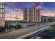 Street view of an oceanfront condo building with beach access, parking and street lights at 1420 S Ocean Blvd., North Myrtle Beach, SC 29582