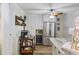 Spacious kitchen with stainless steel refrigerator, wine storage, and center island at 1420 S Ocean Blvd., North Myrtle Beach, SC 29582