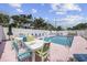 Inviting pool area with tables and lounge chairs at 1420 S Ocean Blvd., North Myrtle Beach, SC 29582