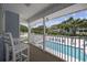Relaxing outdoor patio with a view of the pool at 1420 S Ocean Blvd., North Myrtle Beach, SC 29582