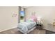 Cozy bedroom featuring a twin bed, neutral decor, and natural light from the window at 1431 Porchfield Dr., Conway, SC 29526